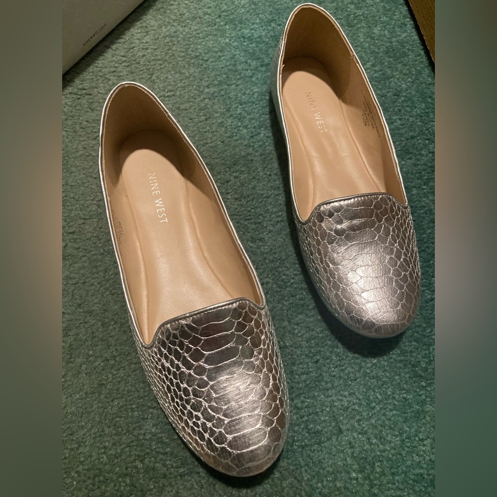 Nine West, silver loafers/flats in size 7.5. Brand New (never worn)